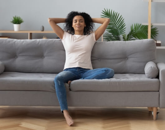 Woman relaxing on couch