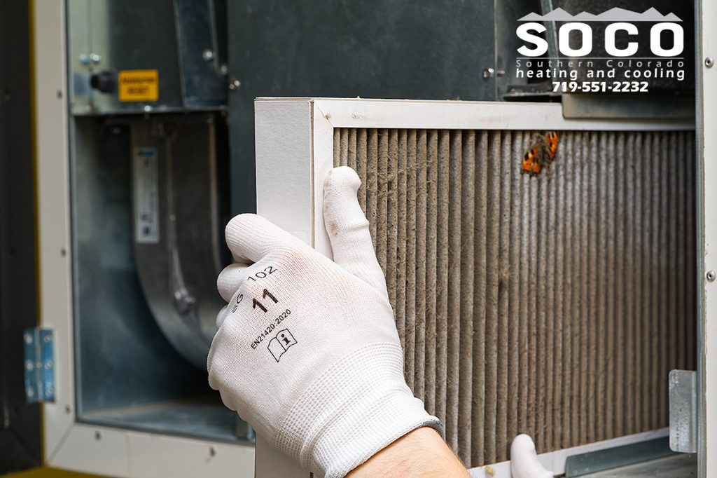 Replacing the filter in a home furnace