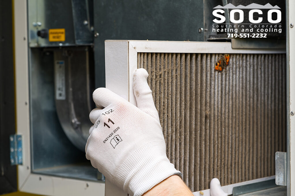 Replacing the filter in a home furnace