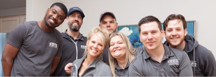 SoCo Heating and Cooling team members smiling together